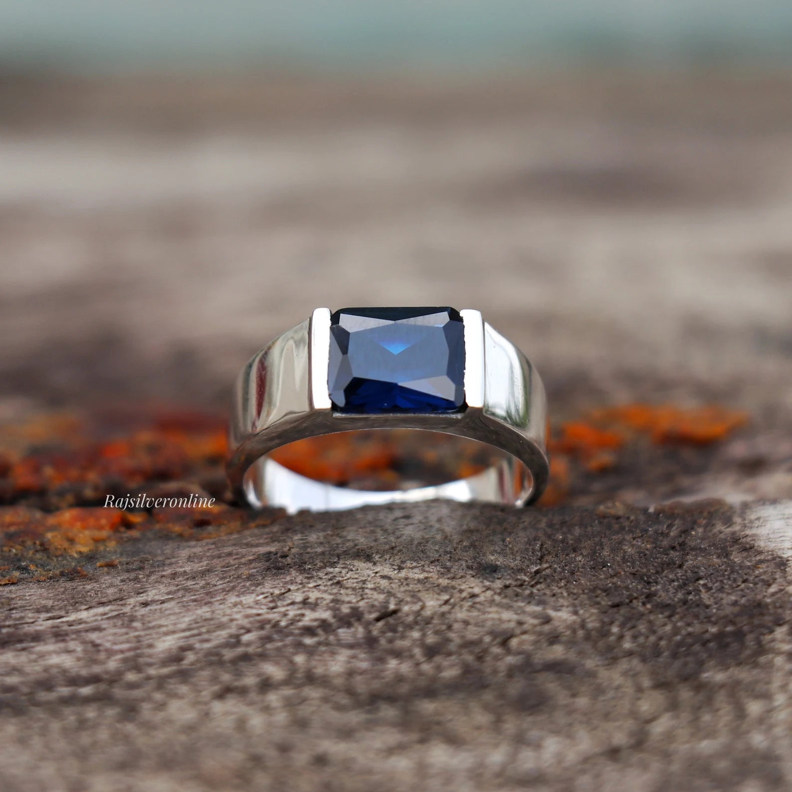 Menβs Deep Blue Sapphire Emerald Cut Ring
