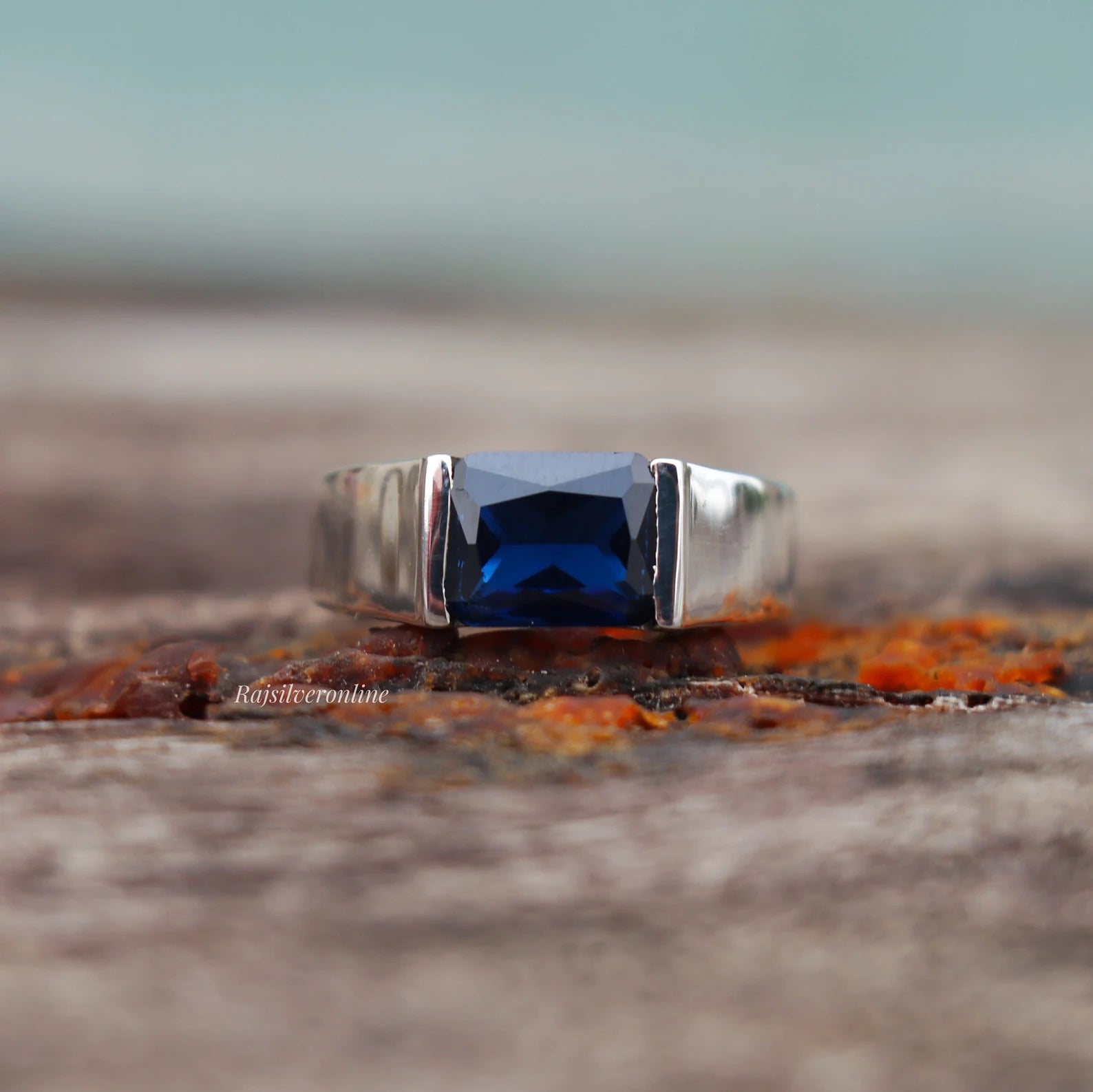 Menβs Deep Blue Sapphire Emerald Cut Ring