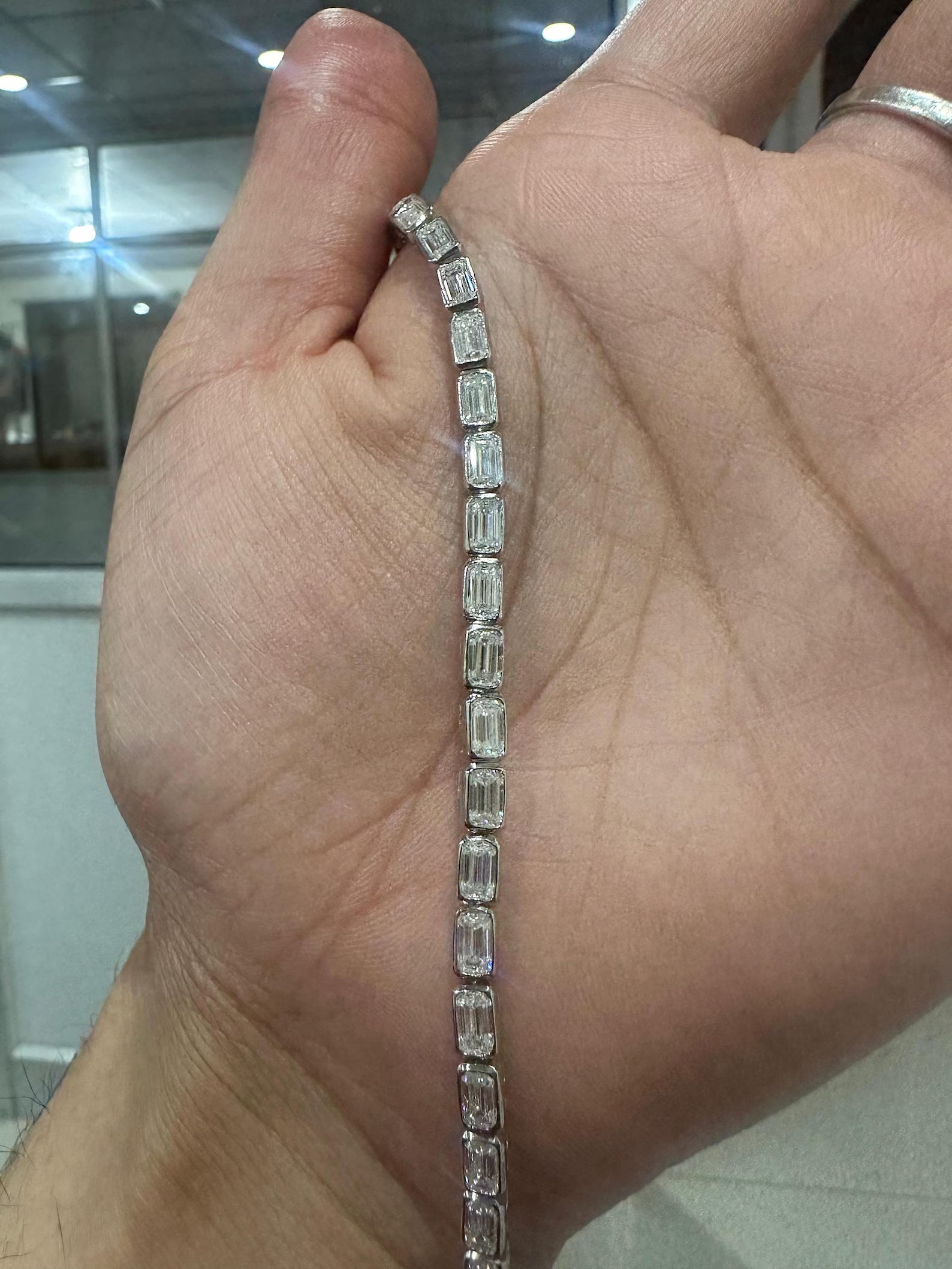 Elite Emerald-Cut Bezel Tennis Bracelet