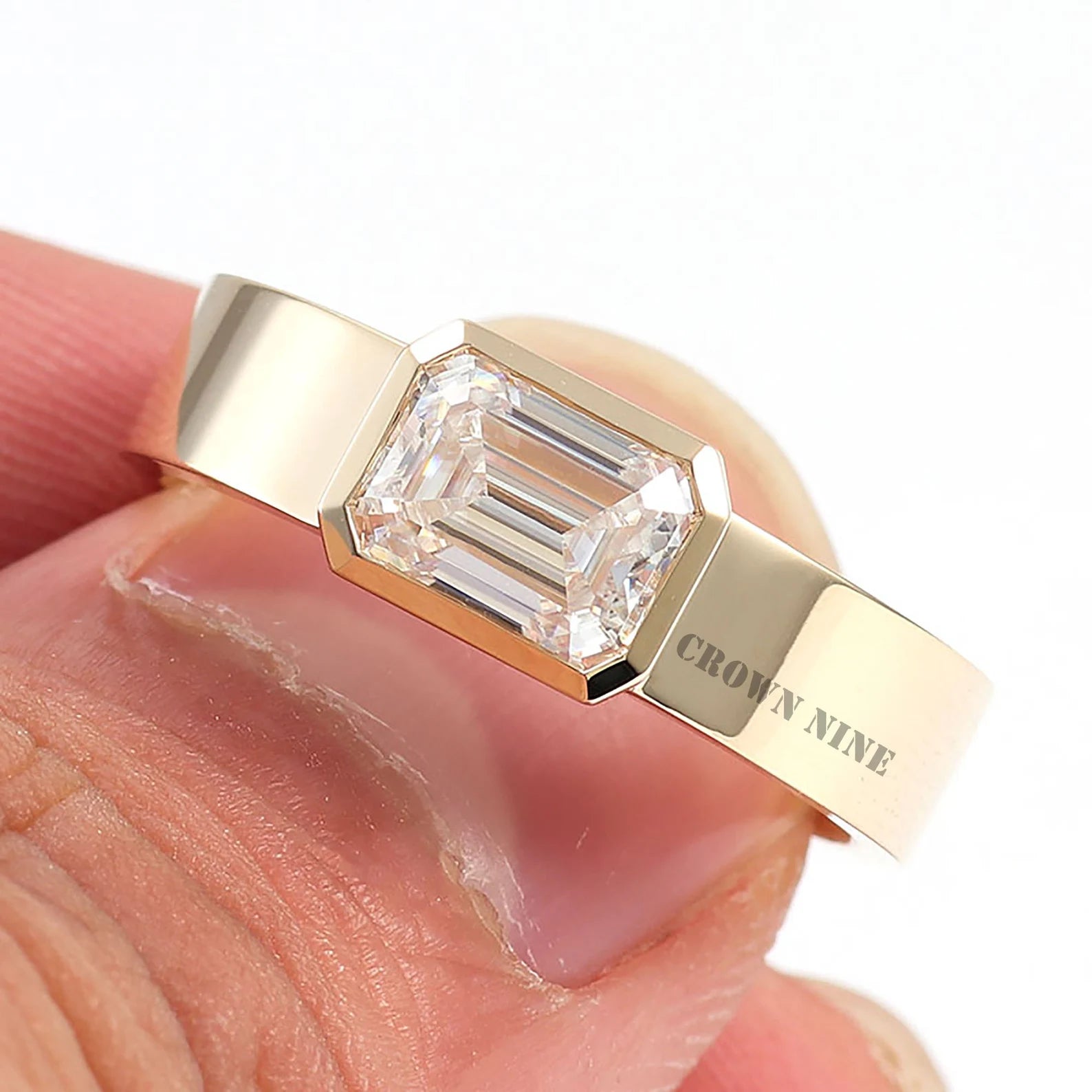 Emerald Cut Bezel Solitaire Ring