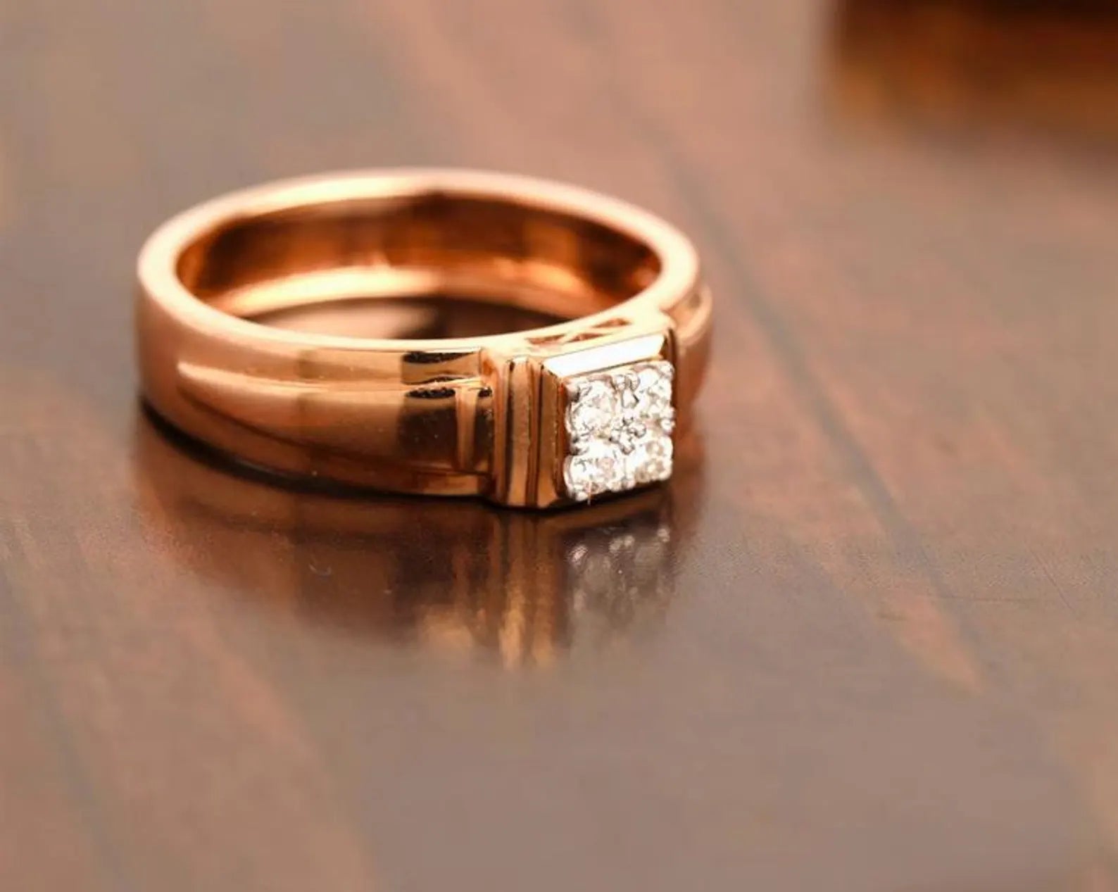 Men’s Emerald Cut Bridge Solitaire Ring