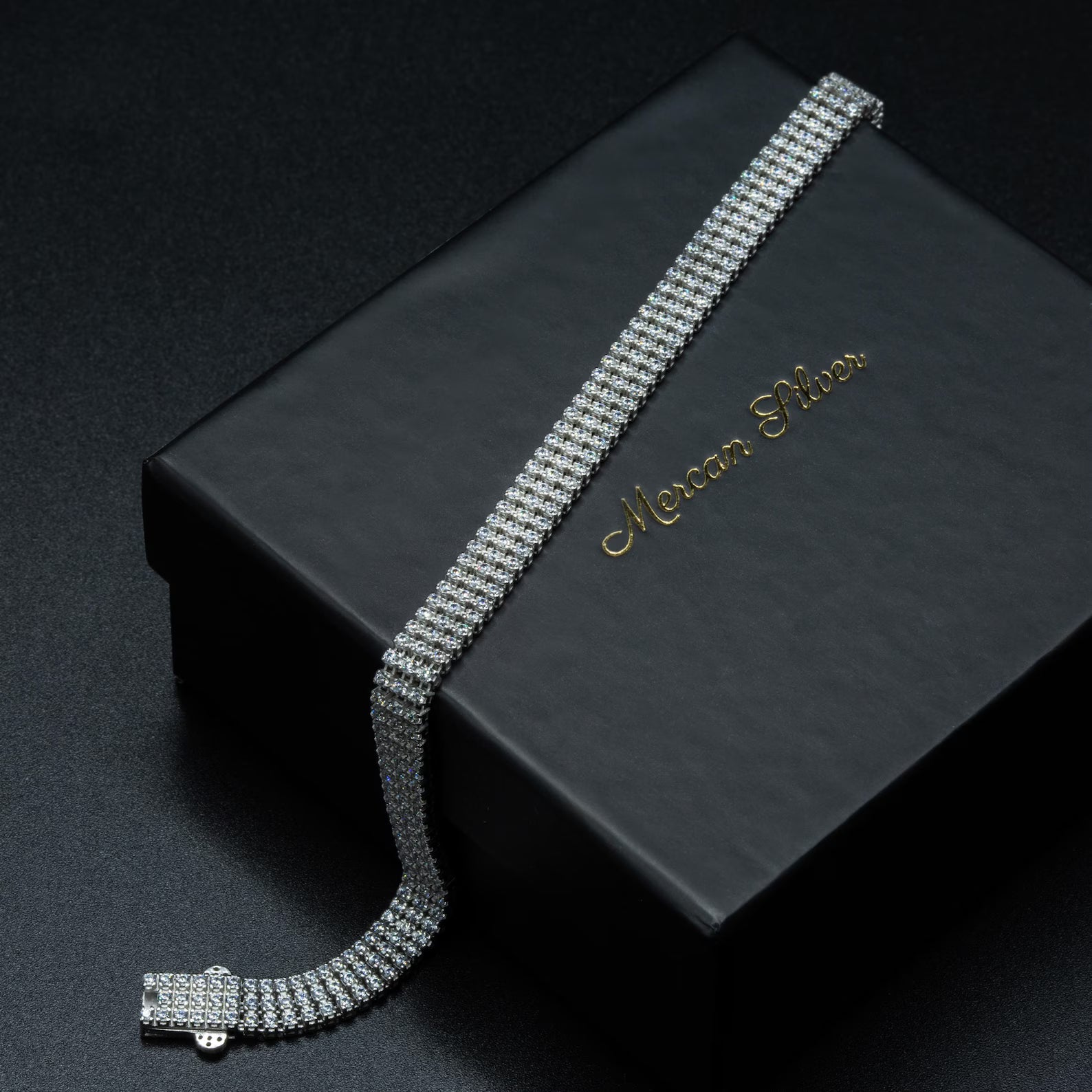 Grand Emerald Cut Infinite Tennis Bracelet